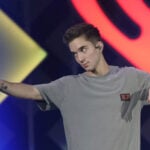 Ex-girlfriend of boy band member charged with trying to hire a hitman to kill him