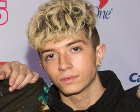 Ex-girlfriend of boy band member charged with trying to hire a hitman to kill him
