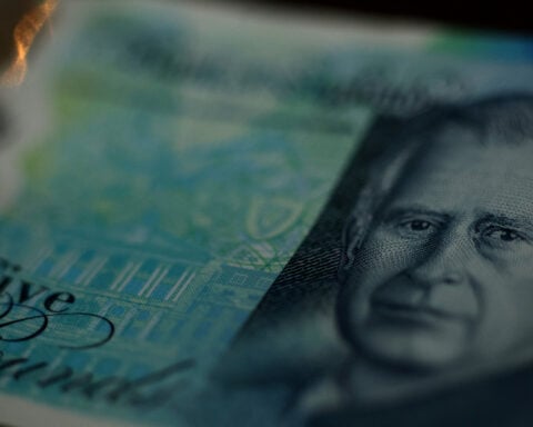 Pound softens as UK consumers cut spending, public finances worsen