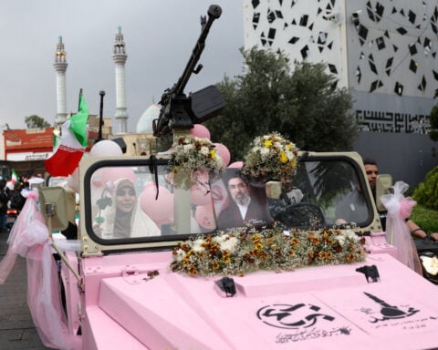 Iran propaganda push seeks to project unity despite internal divisions
