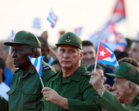 Cubans gather before US embassy in Havana to protest Raul Castro indictment