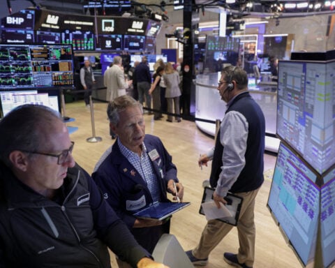 Wall St rises at open, Dow hits record high