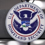 US tells foreigners seeking green cards: Return to your countries to apply