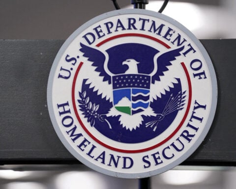 US tells foreigners seeking green cards: Return to your countries to apply