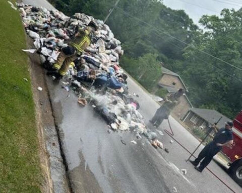 An entire load of garbage was dumped on street to put out a fire caused by batteries