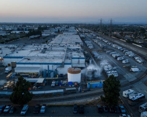 Evacuation centers fill up in southern California as efforts continue to cool damaged chemical tank