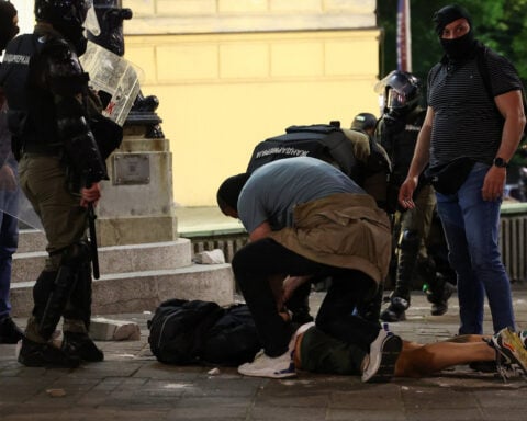 Police and protesters clash in Serbia as crowds demand president's exit