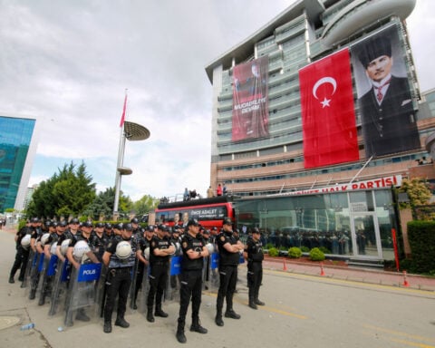 Turkish riot police enter opposition headquarters to evict ousted leaders 