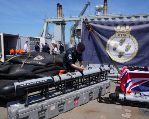 Britain's navy prepares to clear mines in the Strait of Hormuz while waiting for a peace deal