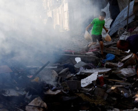 Israeli fire kills parents and their infant in Gaza, medics say