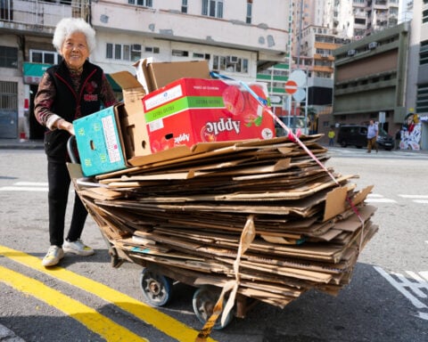 In a city of high-rises, ‘cardboard grannies’ collect waste for cash