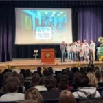 High school honors 90-year-old janitor with surprise birthday celebration