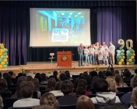 High school honors 90-year-old janitor with surprise birthday celebration