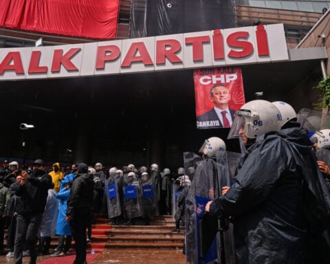 Turkish police storm offices of the main opposition CHP party, firing tear gas and rubber bullets