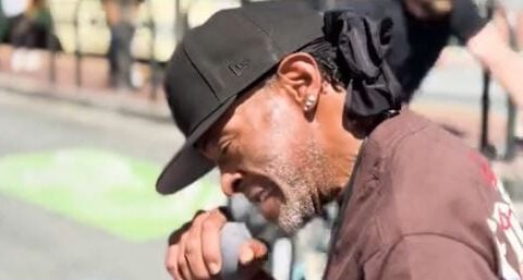 Regular performer outside San Francisco's Orpheum Theatre says singing saved his life