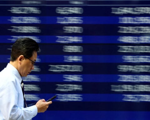 Stocks rally, while oil and dollar ease on Middle East peace hopes