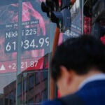 Asian shares mostly gain and oil prices fall after Trump says peace talks on Iran war are proceeding