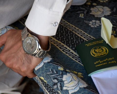 Pakistan Shi'ites deported from UAE return to lost jobs, frozen savings