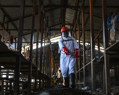 A second Ebola treatment center is set ablaze in eastern Congo, with 18 suspected cases fleeing