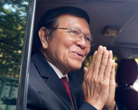 Cambodian king pardons former opposition leader