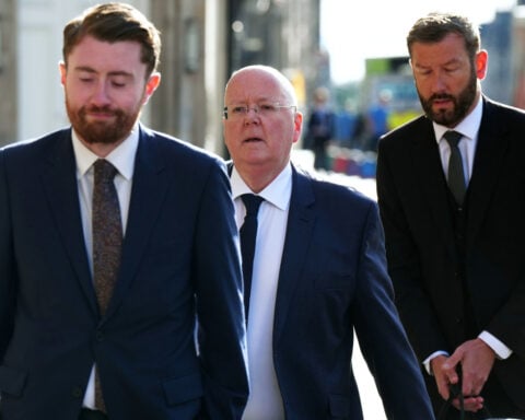 Estranged husband of former Scottish leader admits $540K embezzlement of party funds
