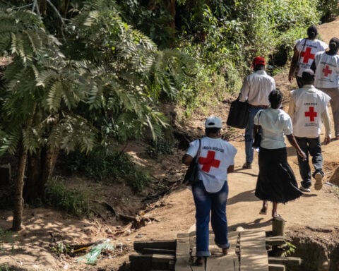 Attacks from suspicious residents complicate the fight against a rare type of Ebola