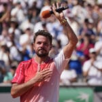 Wawrinka waves emotional goodbye to French Open after losing in first round