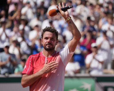 Wawrinka waves emotional goodbye to French Open after losing in first round