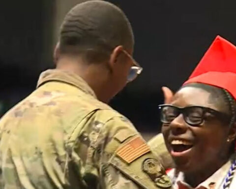Air Force father surprises high school graduate after flying home from Japan