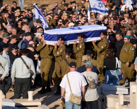 Israel's military says it's striking Hezbollah sites as Netanyahu vows to 'increase the blows'