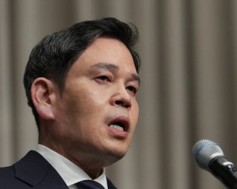 South Korean Starbucks boss apologizes for ad campaign that evoked massacre