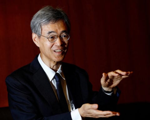 BOJ's Himino says Mideast developments will factor into rate decision