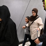 19 Australian women and children linked to Islamic State group set to return from Syria