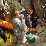 Search continues for 7 villagers trapped in a flooded Laos cave