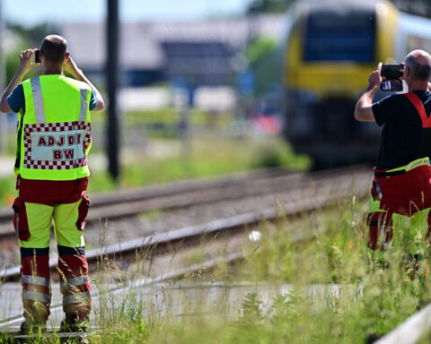 Four killed as Belgian school bus hit by train after appearing to plow through barrier