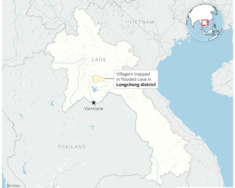 Search continues for 7 villagers trapped in a flooded cave in Laos