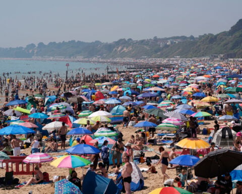 Parts of Europe swelter in record May heat as deaths at amateur sports events spur warnings