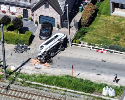 Belgian train hits school minivan, killing four including pupils