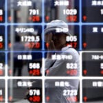 Asian shares climb, oil holds gains as markets eye Iran talks, central bank moves
