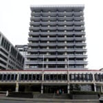 NZ central bank flags imminent hikes to counter energy shock after narrow hold