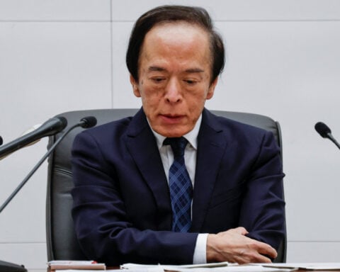 Markets cheer, central banks warn