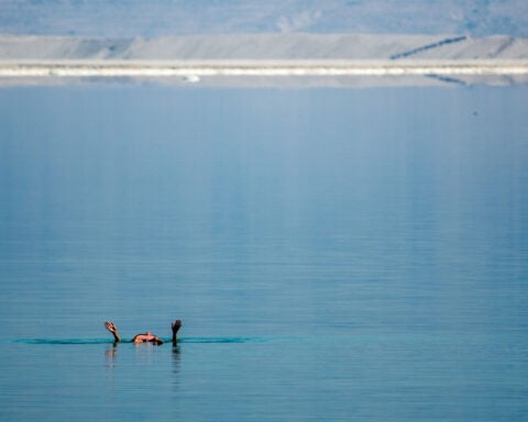 In the lowest place on Earth, a sea is rapidly dying — and no one can agree how to save it