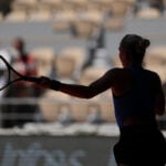 Iga Swiatek improves career record at French Open to 42-3 as she reaches 3rd round