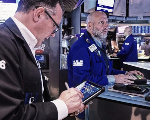 US stocks inch to more records after oil prices drop