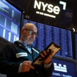 Wall St opens higher on AI optimism, Mideast truce hopes