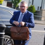 Northern Ireland's former unionist leader faces trial in sexual abuse case involving 2 girls