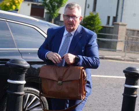 Northern Ireland's former unionist leader faces trial in sexual abuse case involving 2 girls
