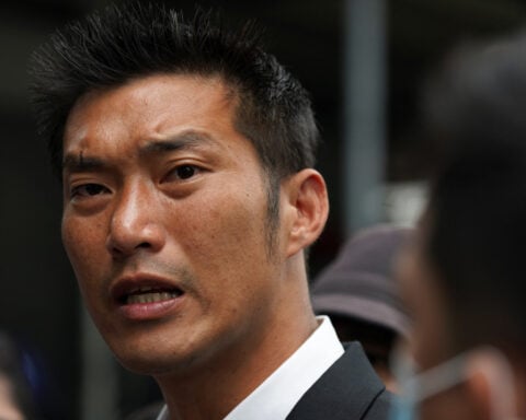 Thai court acquits opposition politician accused of royal insult