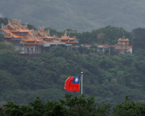 China says Taiwan should not 'interfere' in its air force missions around island