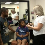 Salon owner hosts “Dads do Hair” workshop